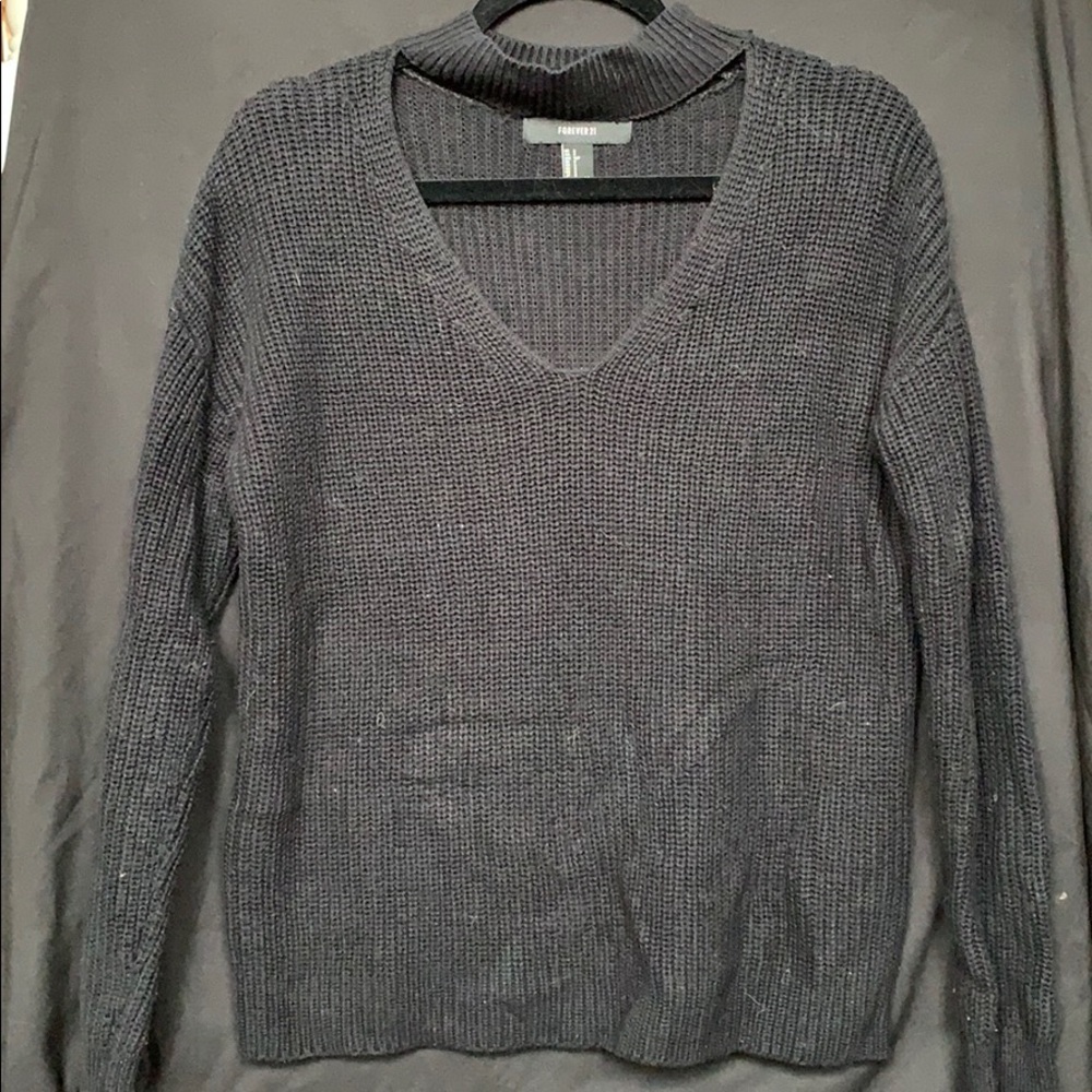 Black neck cut-out sweater